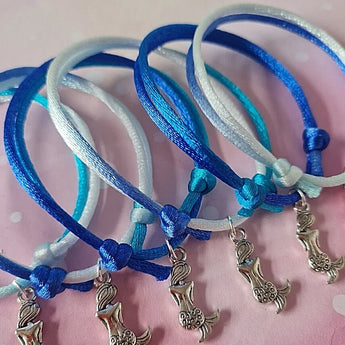 six mermaid charm bracelets party favours