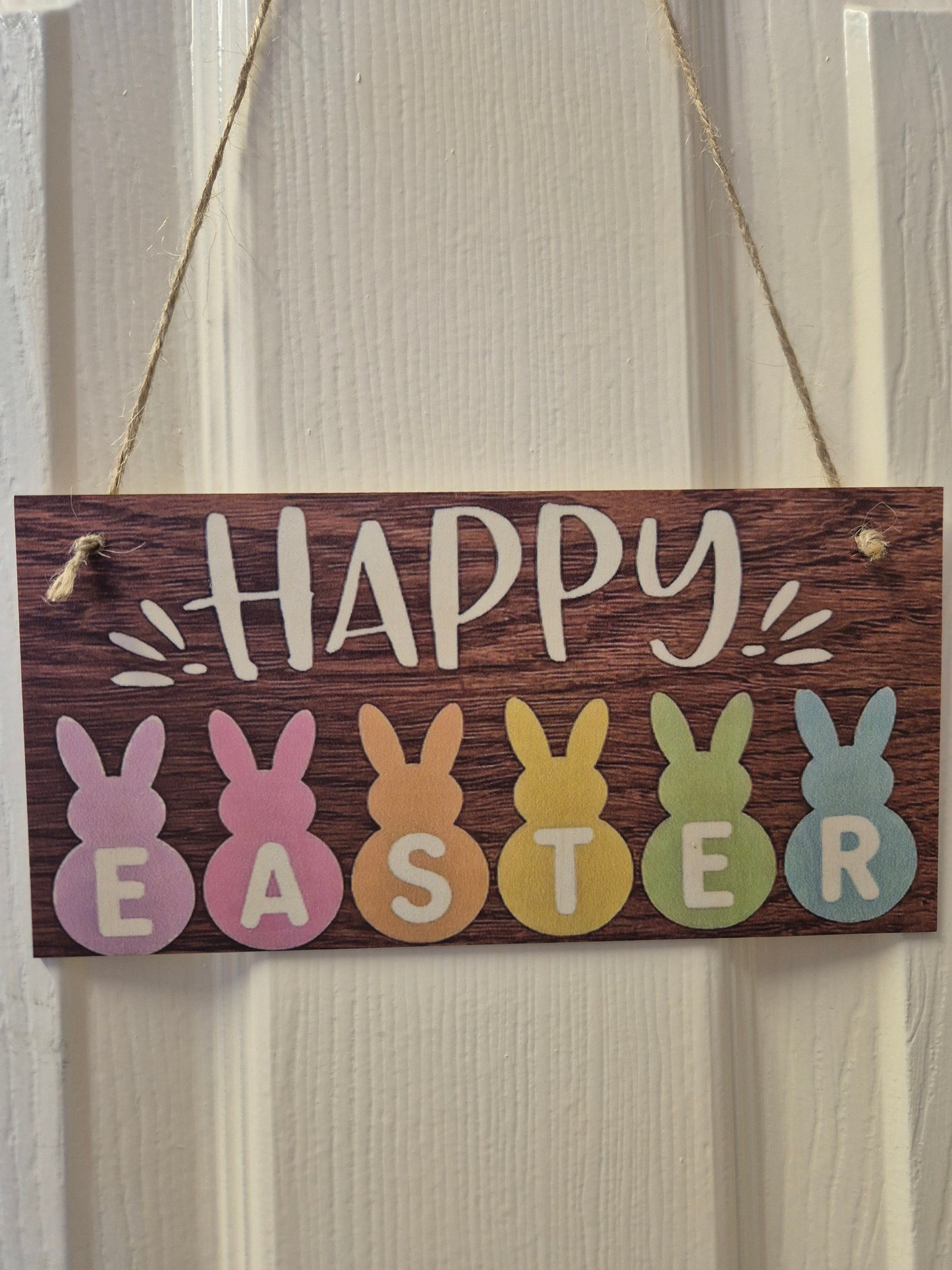 Happy Easter Wooden Sign painted rabbits.